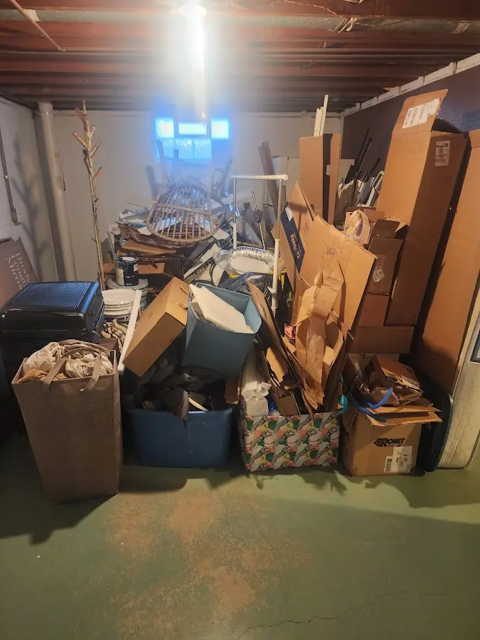 Roll-off dumpster container at job site for Roll Off Dumpster Rental in Boothbay